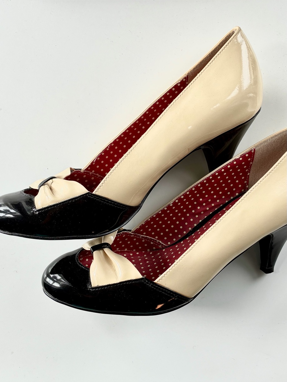 Two-Tone Cream & Black Patent Bow-Trim Pumps B.A.I.T. But Another Innocent Tale